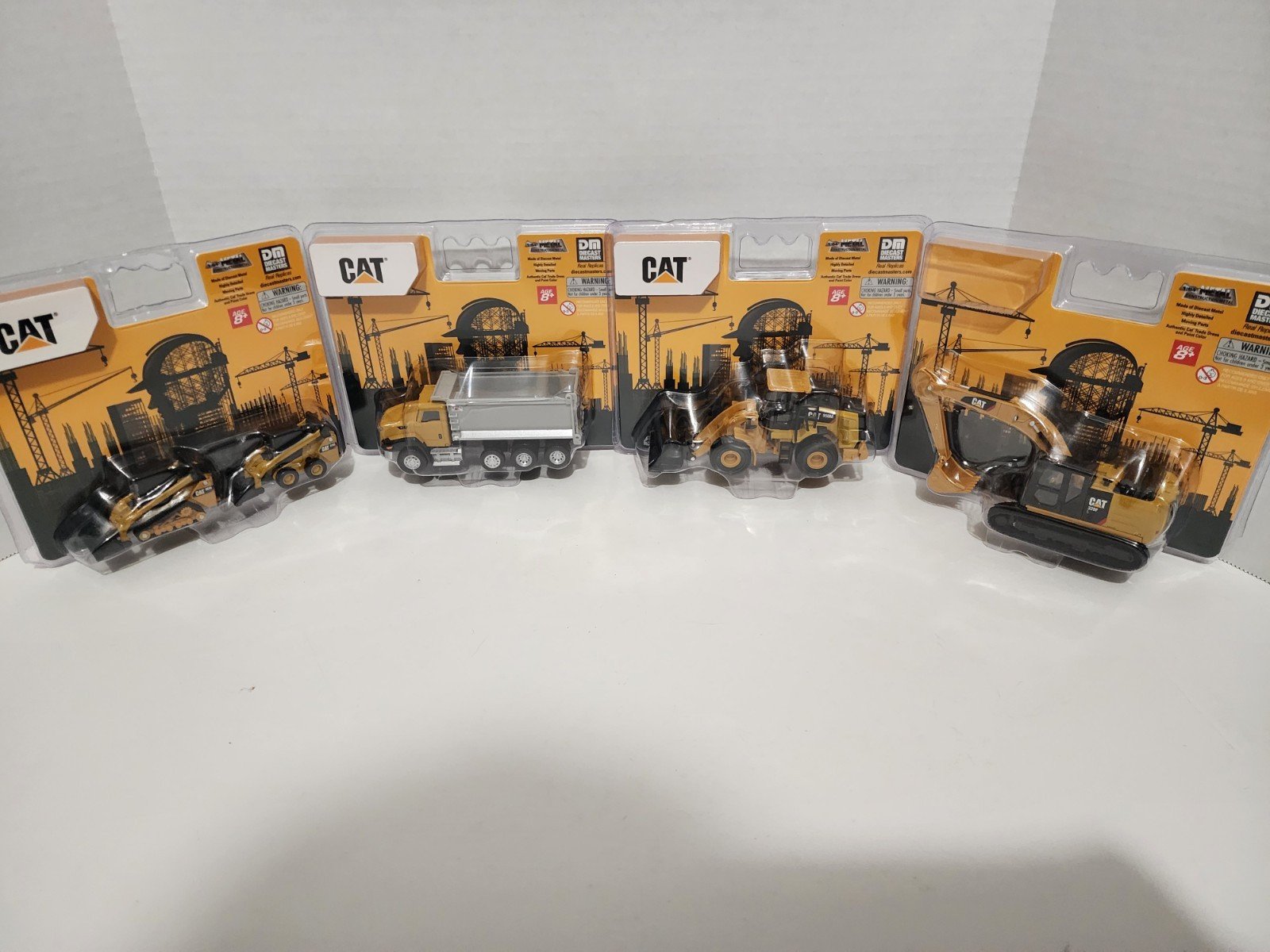 1:64 Diecast Masters Caterpillar 4 Piece Construction Set